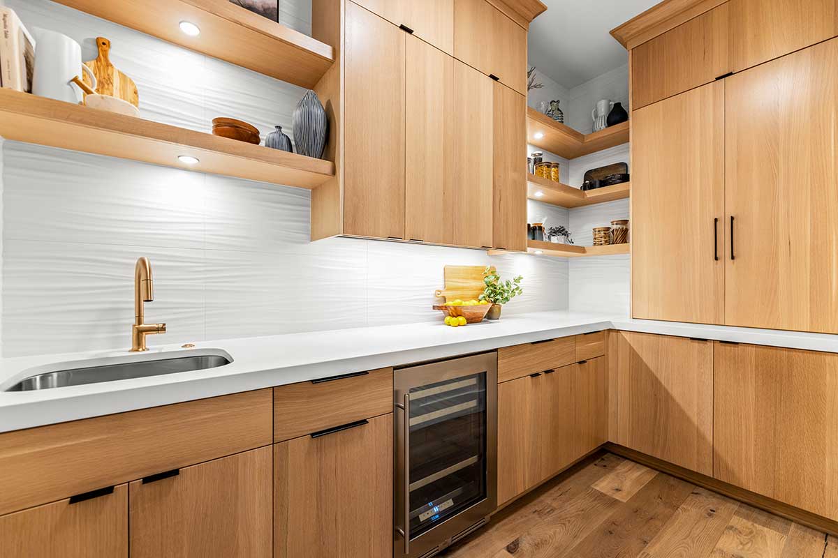 photo of a luxury kitchen with creative tile by Kingston Homes
