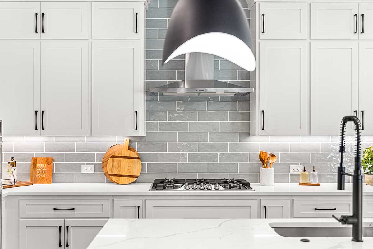 Luxury kitchen with monochromatic tile design